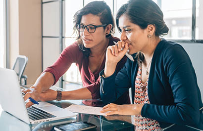 Mexican businesswoman meeting in office