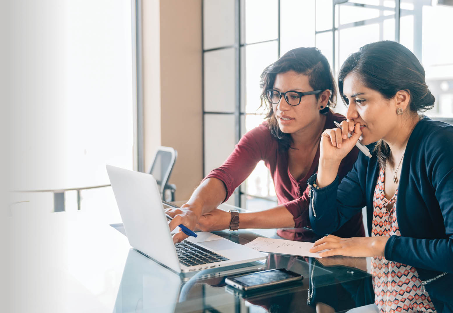 Mexican businesswoman meeting in office