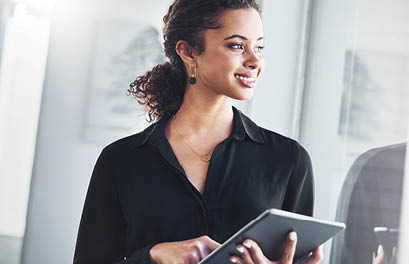 Shot of a young businesswoman using a digital tablet in an office