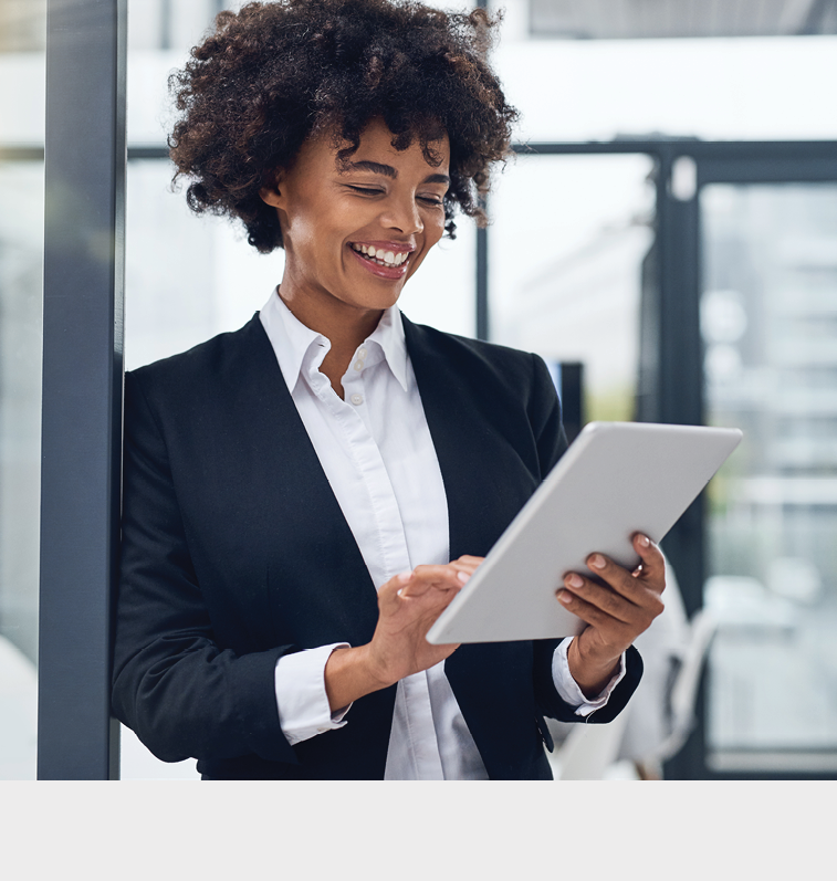 Shot of a young businesswoman using a digital tablet in a modern office