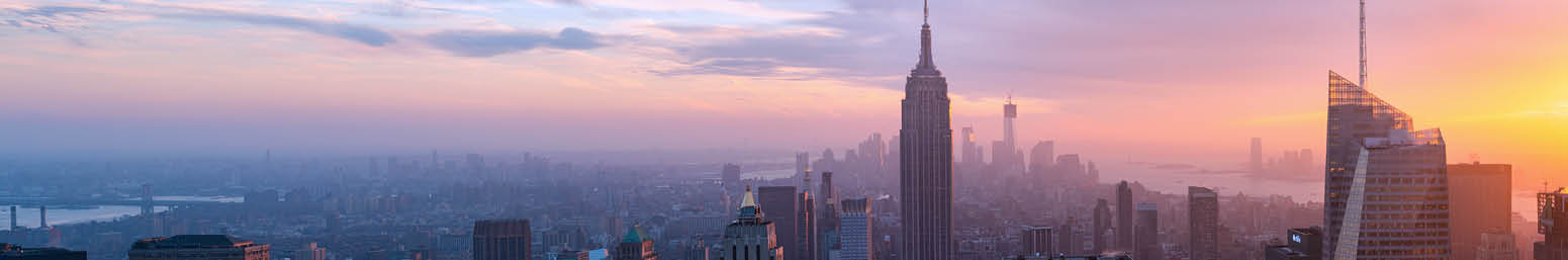 New York, United States - November 23, 2012: Aerial view of lower Manhattan at dusk, with the Empire state building an the Bank of America Tower to be recognized in the foreground 