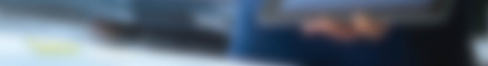 Analyzing data, Businessman working and checking market data in office, hand pointing on the data presented in the chart on tablet